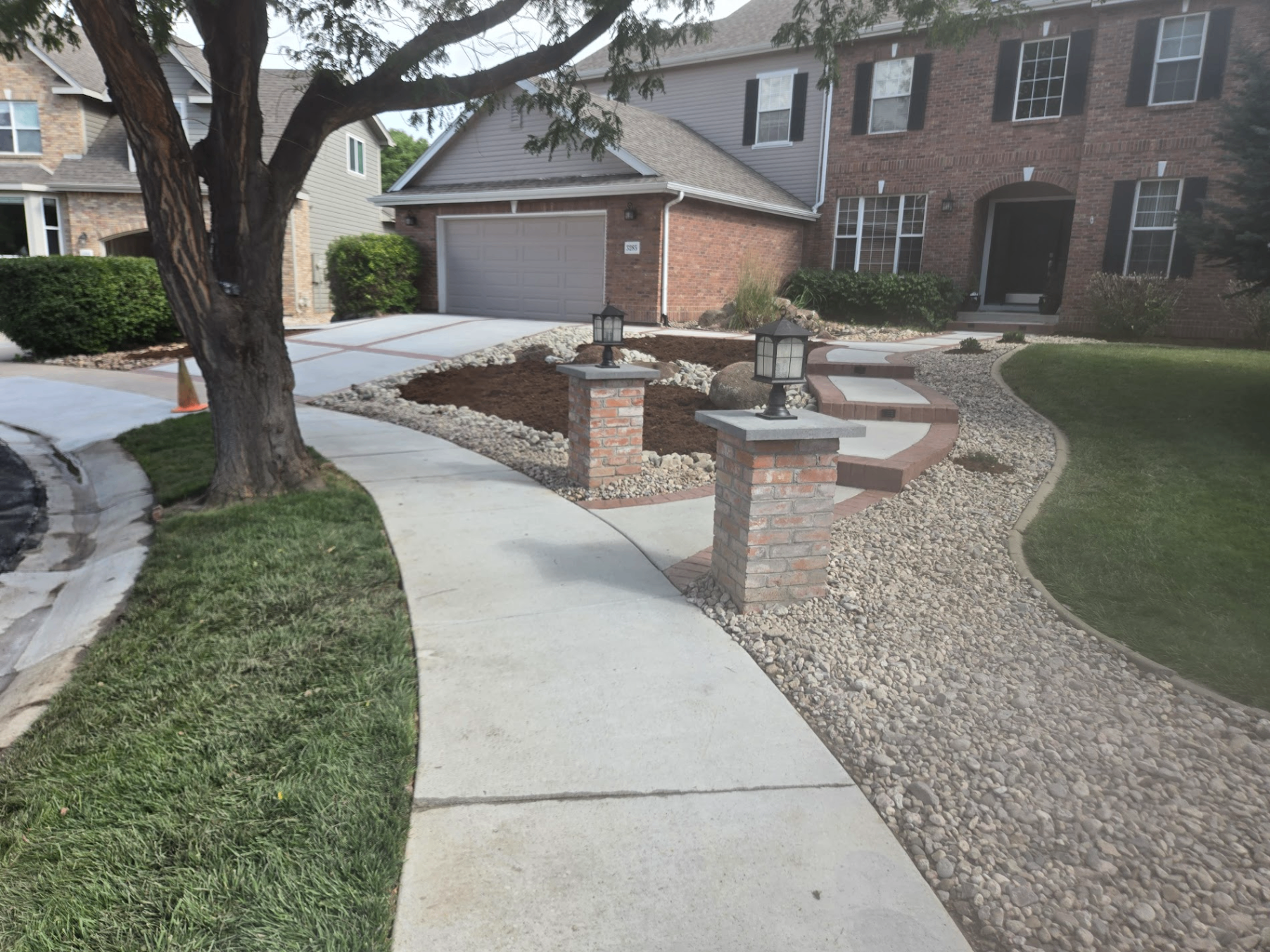 Skyline Concrete crew finishing a residential driveway in Fort Collins